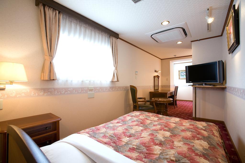 Beppu Station Hotel Quarto foto